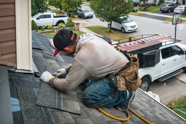 Professional Emergency Roof Repair technician working in Sutton, ND